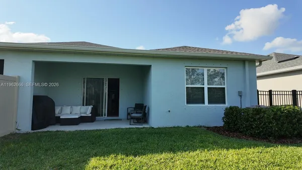 a view of a porch with a yard