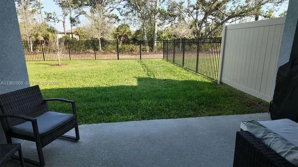 a view of a backyard with a garden