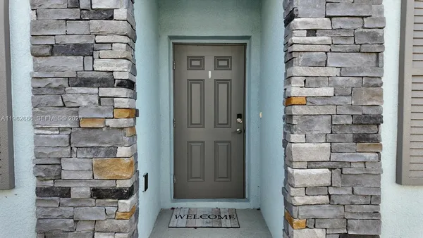 a view of a door and front door