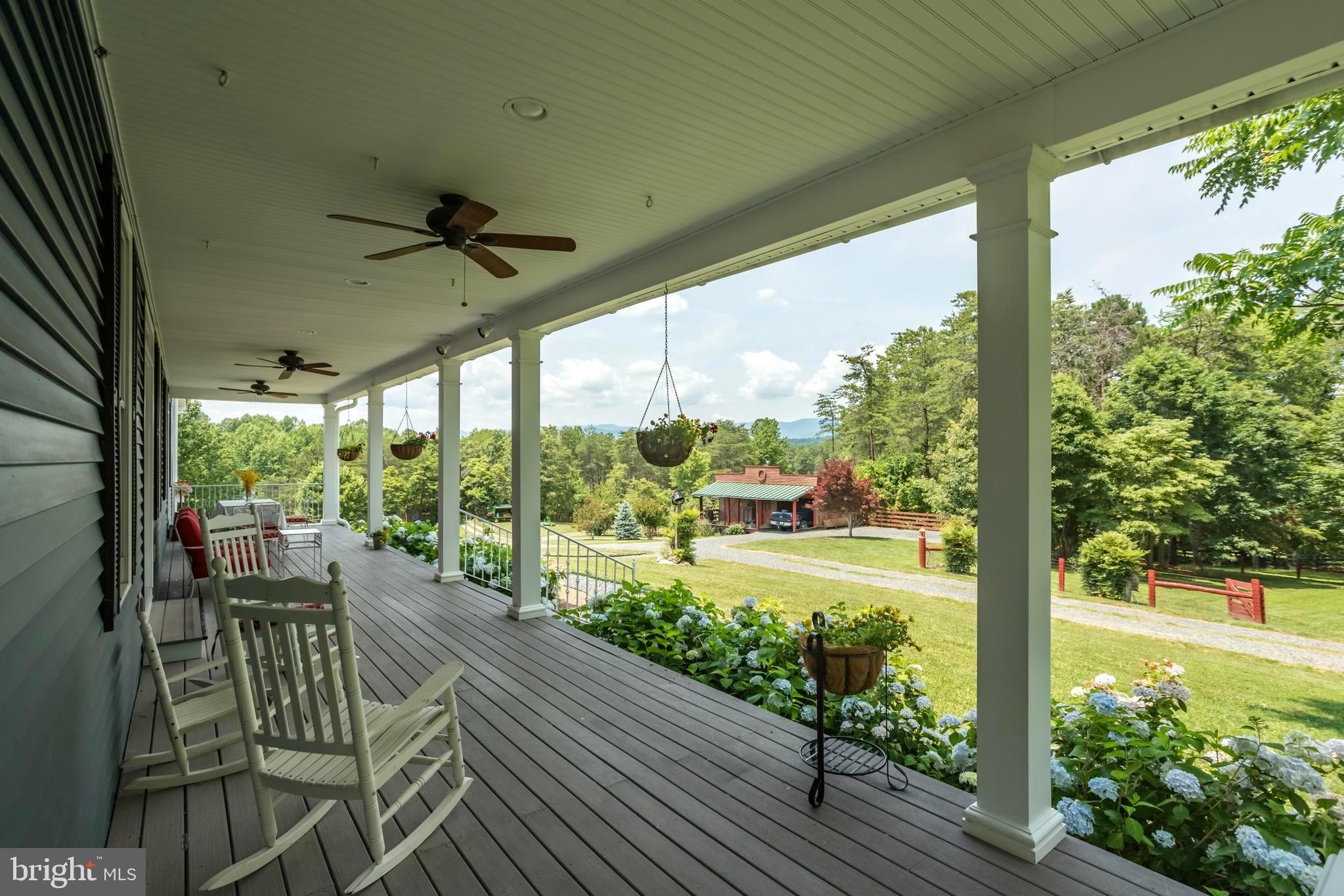 317 Aaron Mountain Road Castleton, VA 22716 - Photo 2 of 65 Catching the breeze and enjoying the mountain view