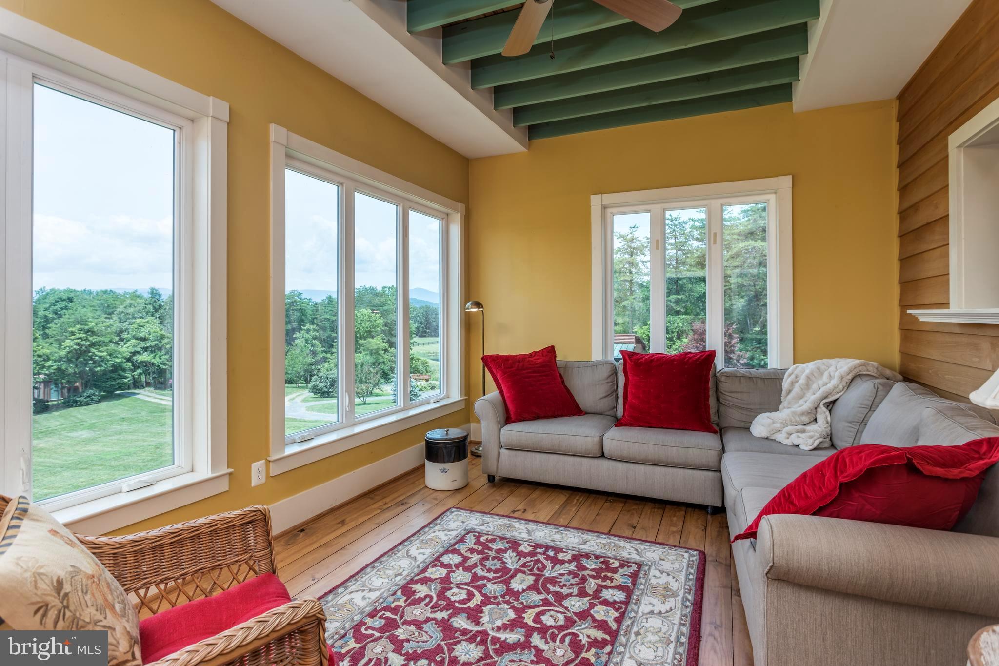 317 Aaron Mountain Road Castleton, VA 22716 - Photo 20 of 65 Kitchen Sunroom with mountain views