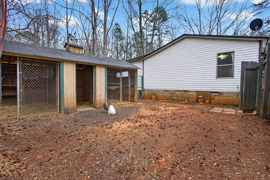 323 Ball Field Road Waleska, GA 30183 - Photo 28 of 39 a view of a house with a yard