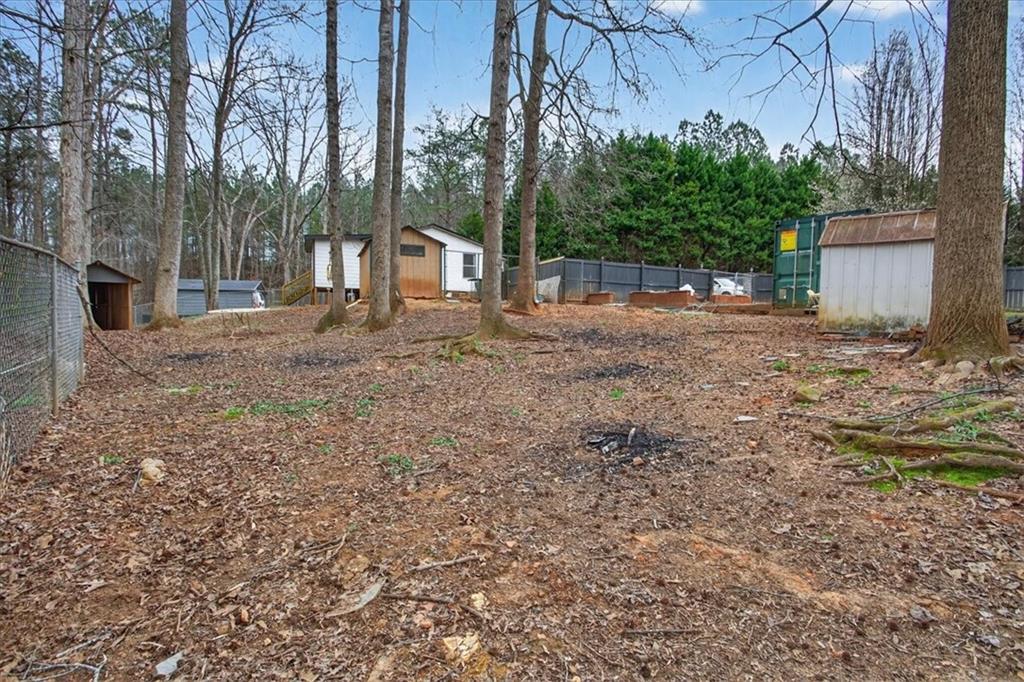 323 Ball Field Road Waleska, GA 30183 - Photo 36 of 39 a view of a backyard with large trees