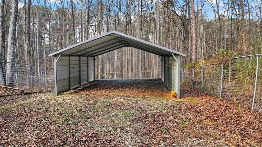 323 Ball Field Road Waleska, GA 30183 - Photo 4 of 39 a backyard of a house with lots of green space