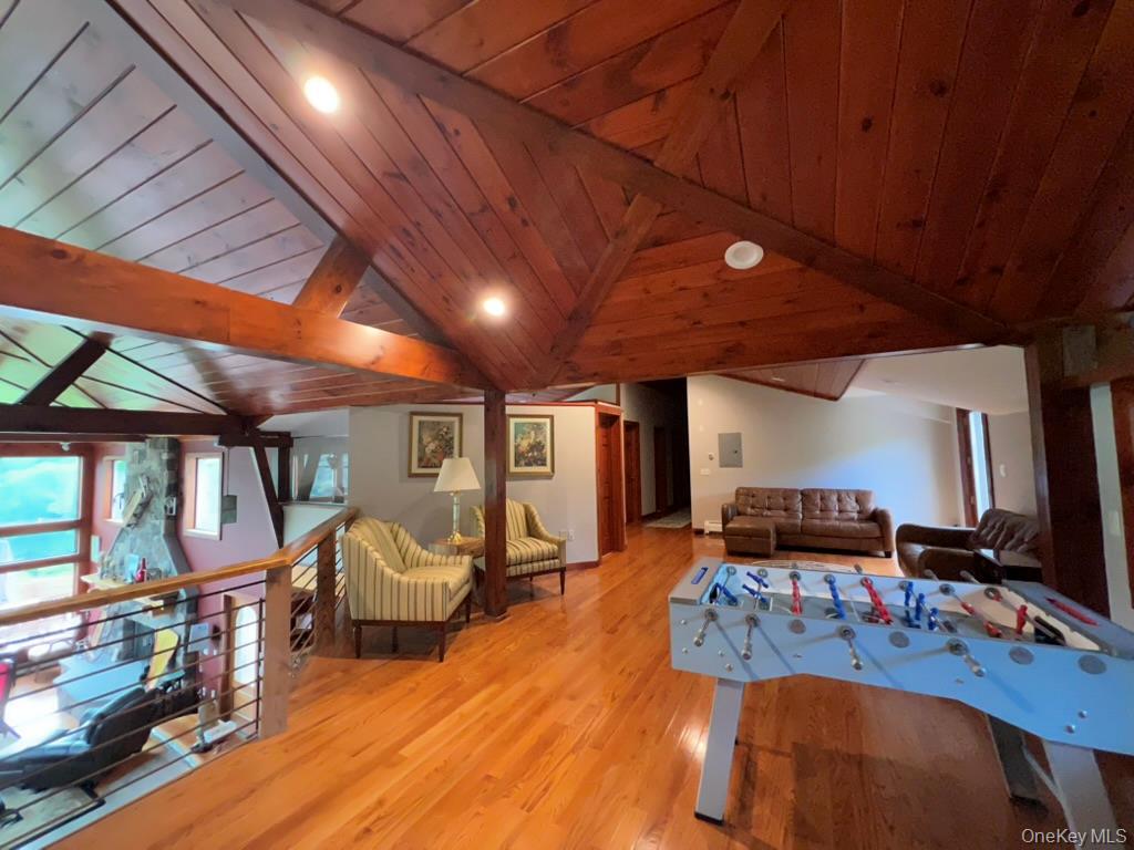 1837 Rich Road Franklin, NY 13775 - Photo 35 of 50 a living room with furniture and a flat screen tv