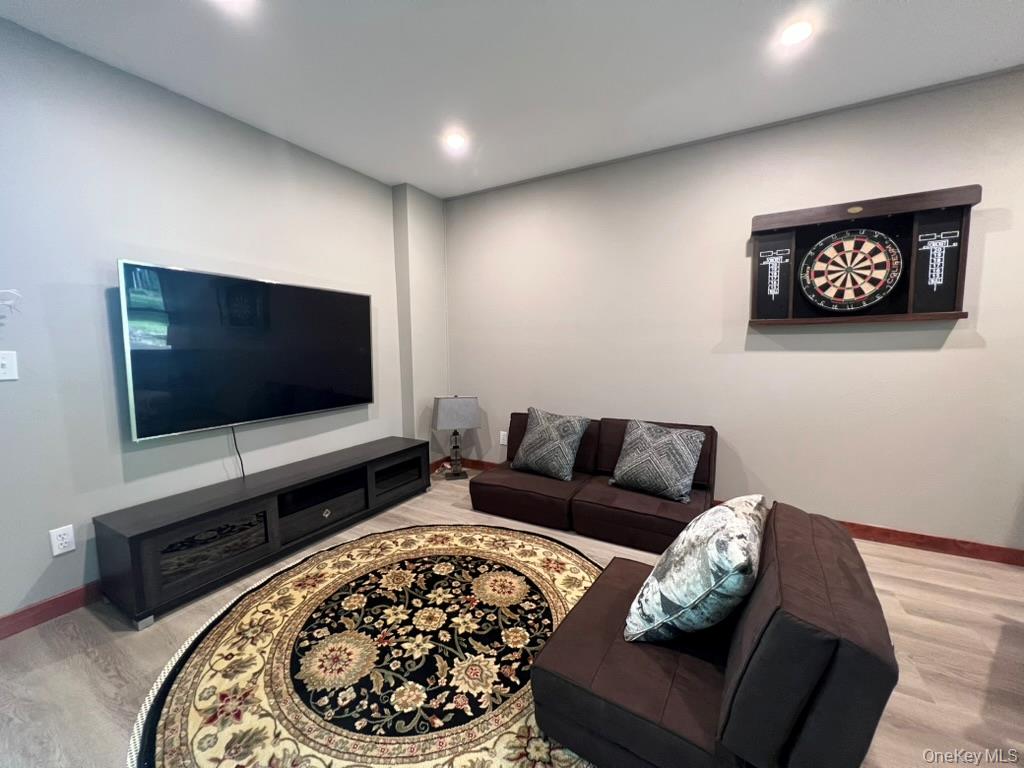 1837 Rich Road Franklin, NY 13775 - Photo 37 of 50 a living room with furniture and a flat screen tv