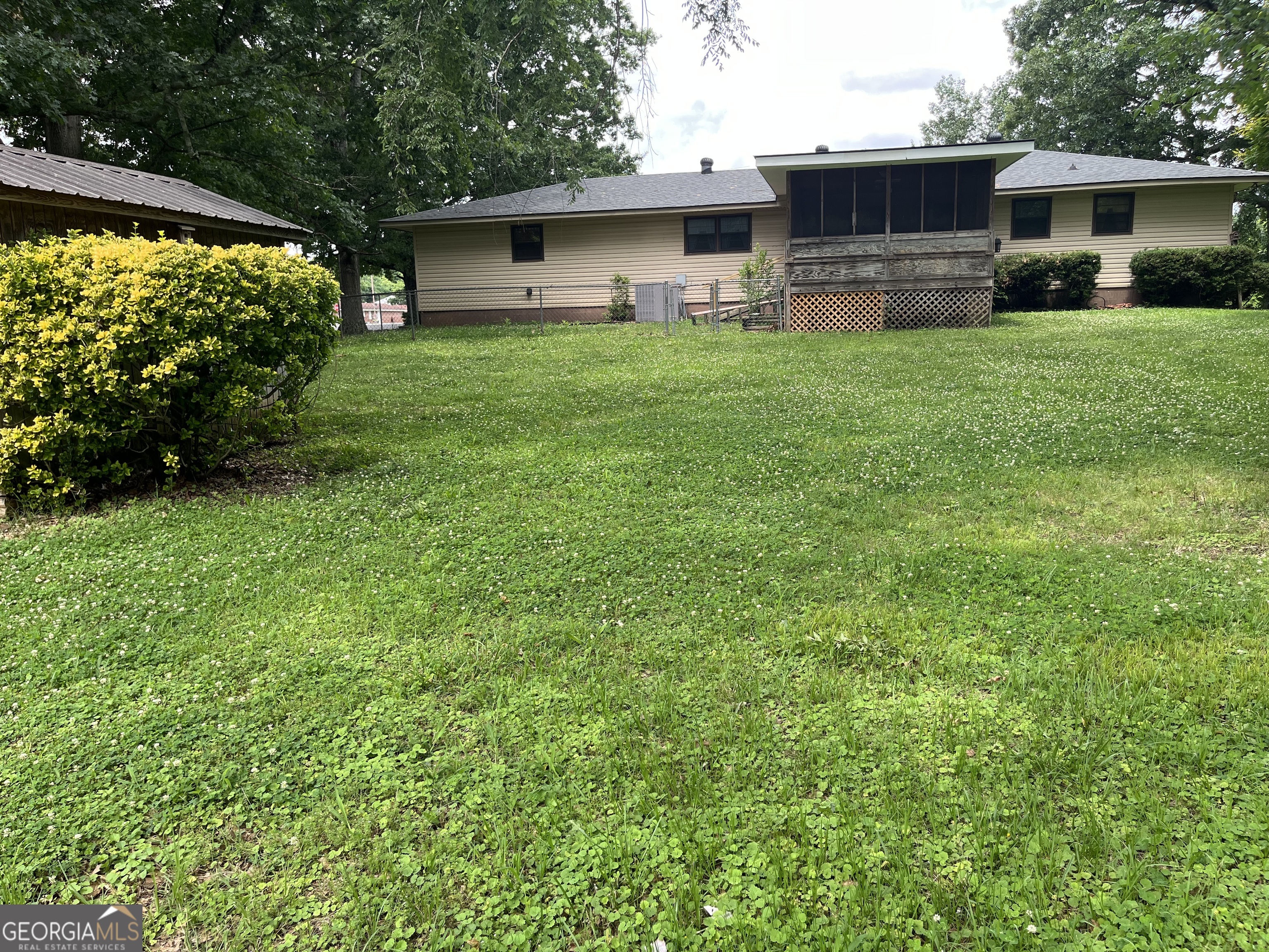 30 Highway 411 Street Southeast Cave Spring, GA 30124 - Photo 2 of 12 a house view with a garden space