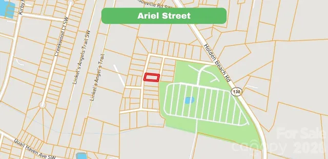 a sign on the green field