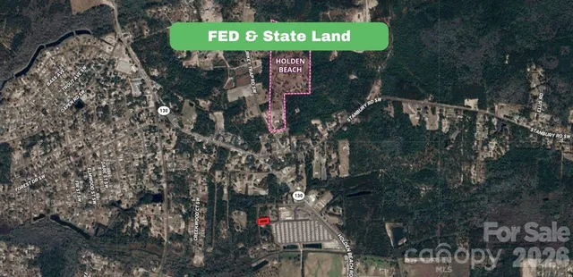 a green sign in a garden