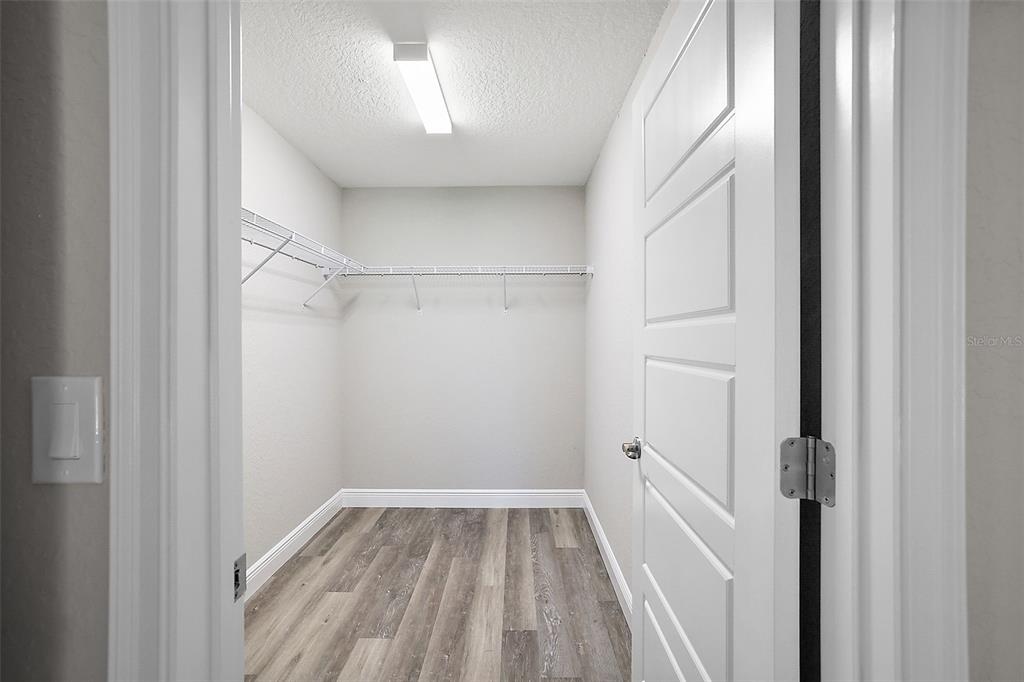 84 Pecan Run Ocala, FL 34472 - Photo 20 of 24 a view of a hallway with white walls