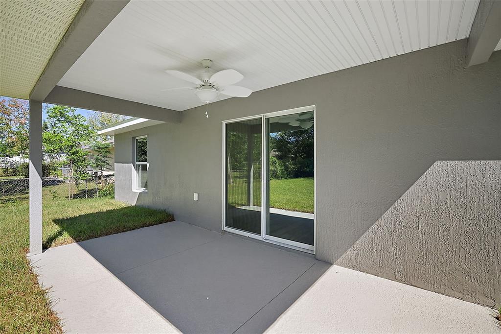 84 Pecan Run Ocala, FL 34472 - Photo 5 of 24 a view of a porch in front of a house