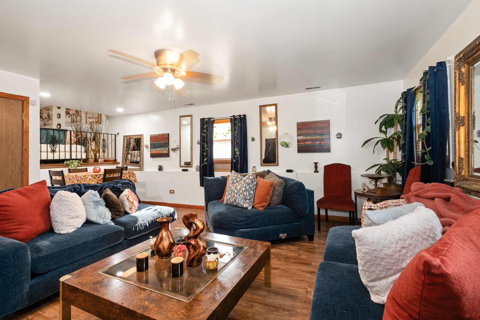 928 East 153rd Street Phoenix, IL 60426 - Photo 16 of 24 a living room with furniture and a large window