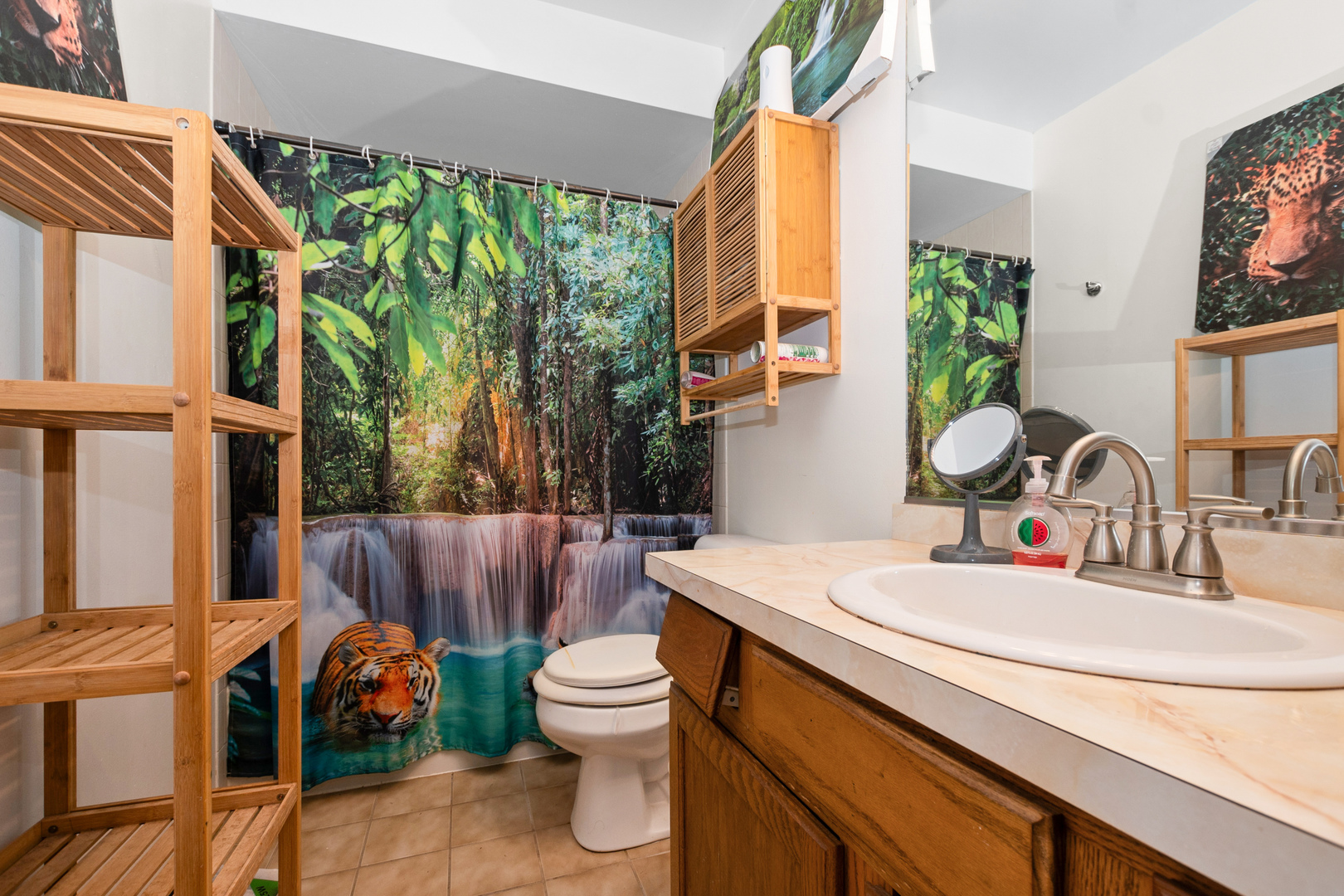 928 East 153rd Street Phoenix, IL 60426 - Photo 19 of 24 a bathroom with a sink a toilet and a mirror