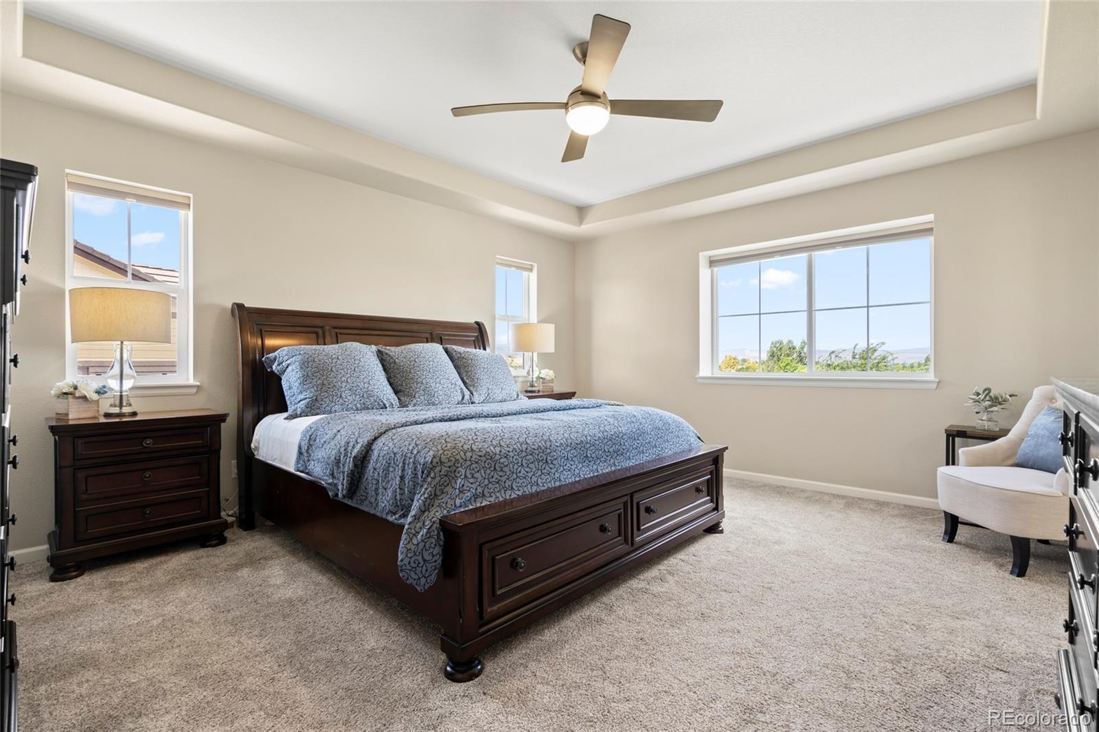10415 Startrail Court Highlands Ranch, CO 80126 - Photo 27 of 49 a bedroom with a bed and a window