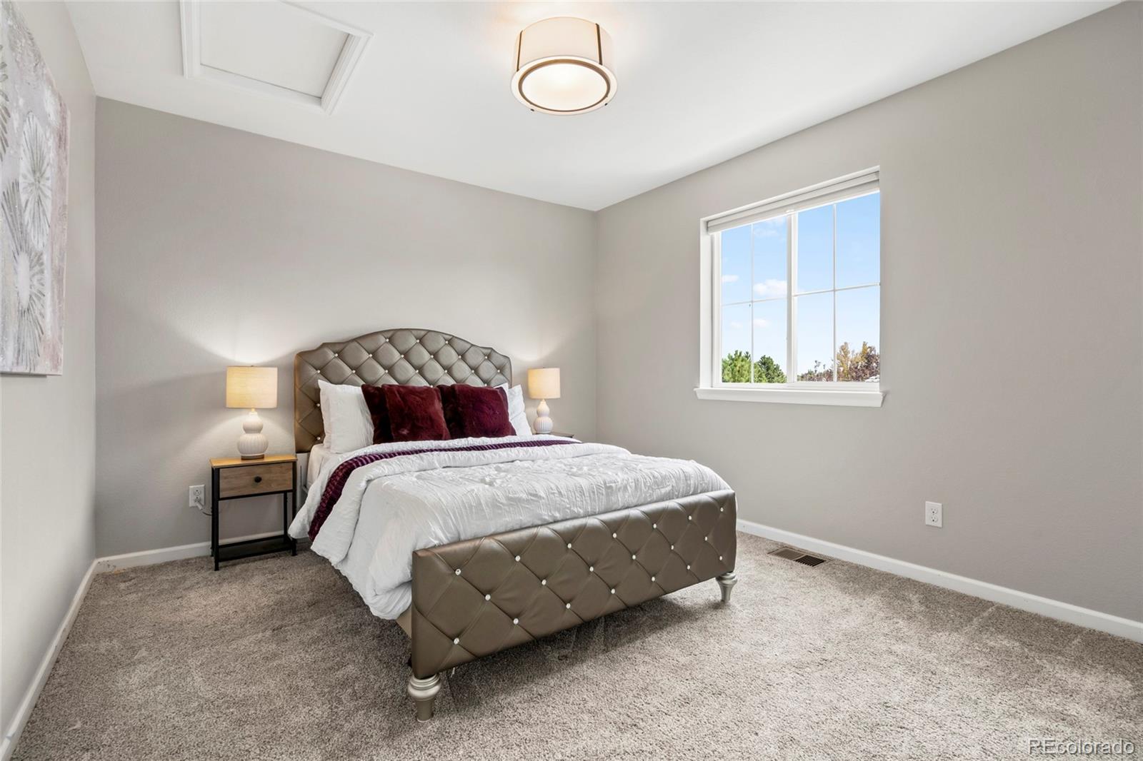 10415 Startrail Court Highlands Ranch, CO 80126 - Photo 33 of 49 a bedroom with a bed and a window