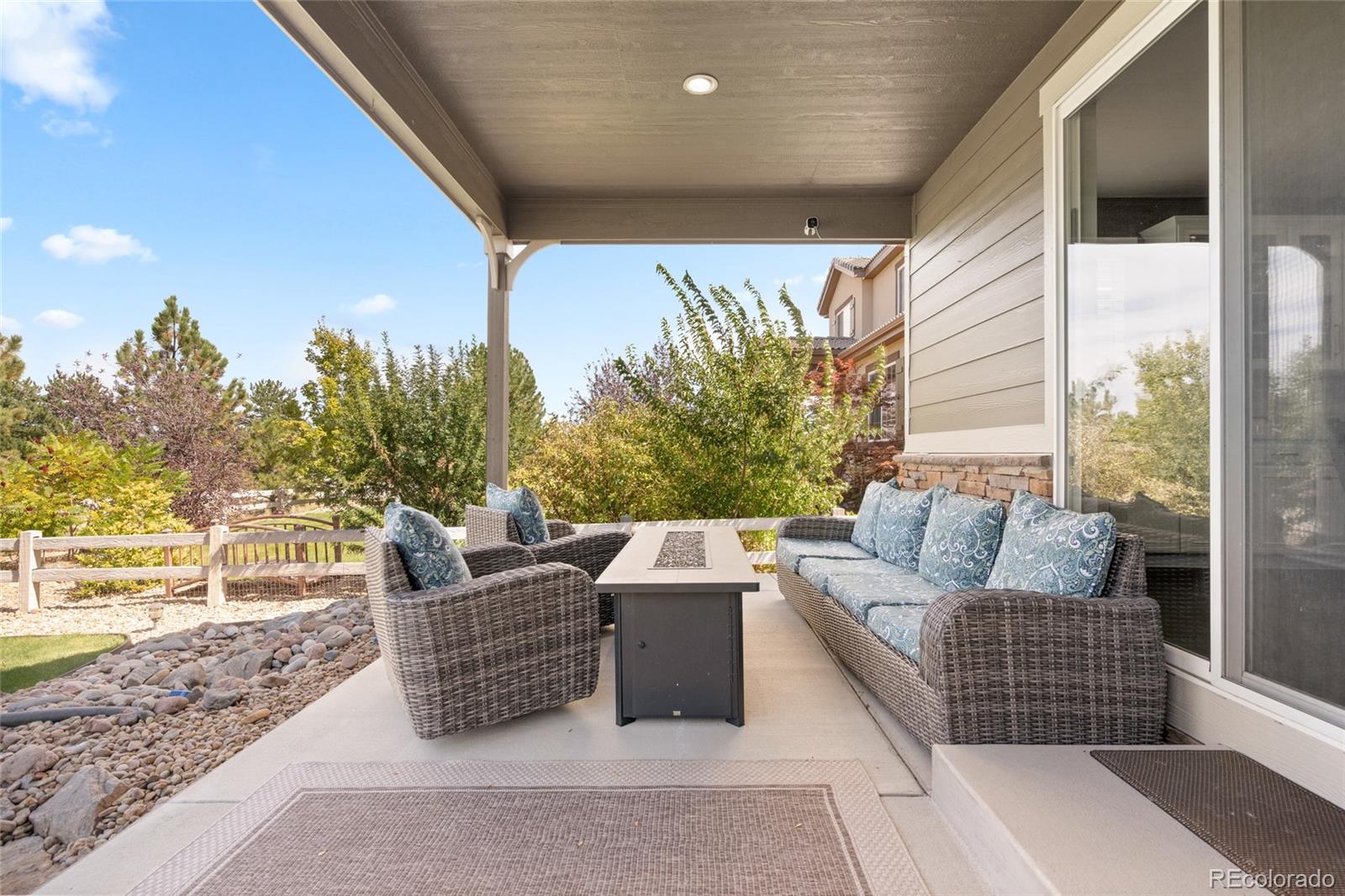 10415 Startrail Court Highlands Ranch, CO 80126 - Photo 42 of 49 a outdoor living space with furniture and a potted plant