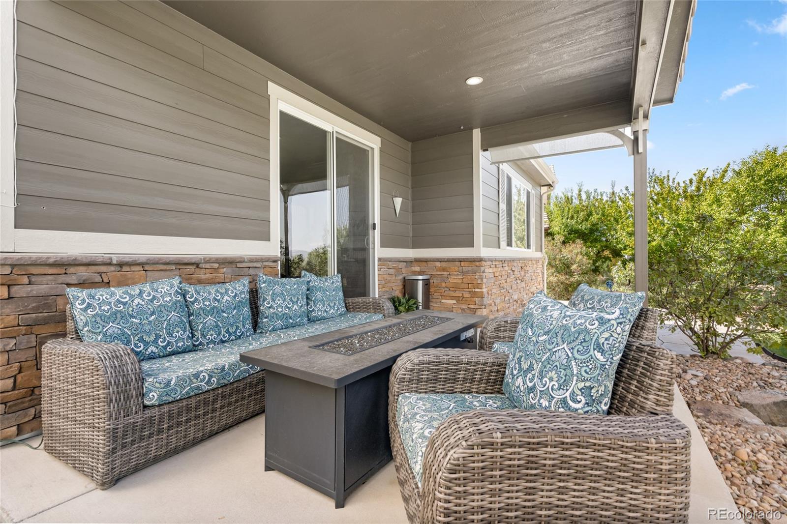 10415 Startrail Court Highlands Ranch, CO 80126 - Photo 43 of 49 a view of patio with couches and a potted plant