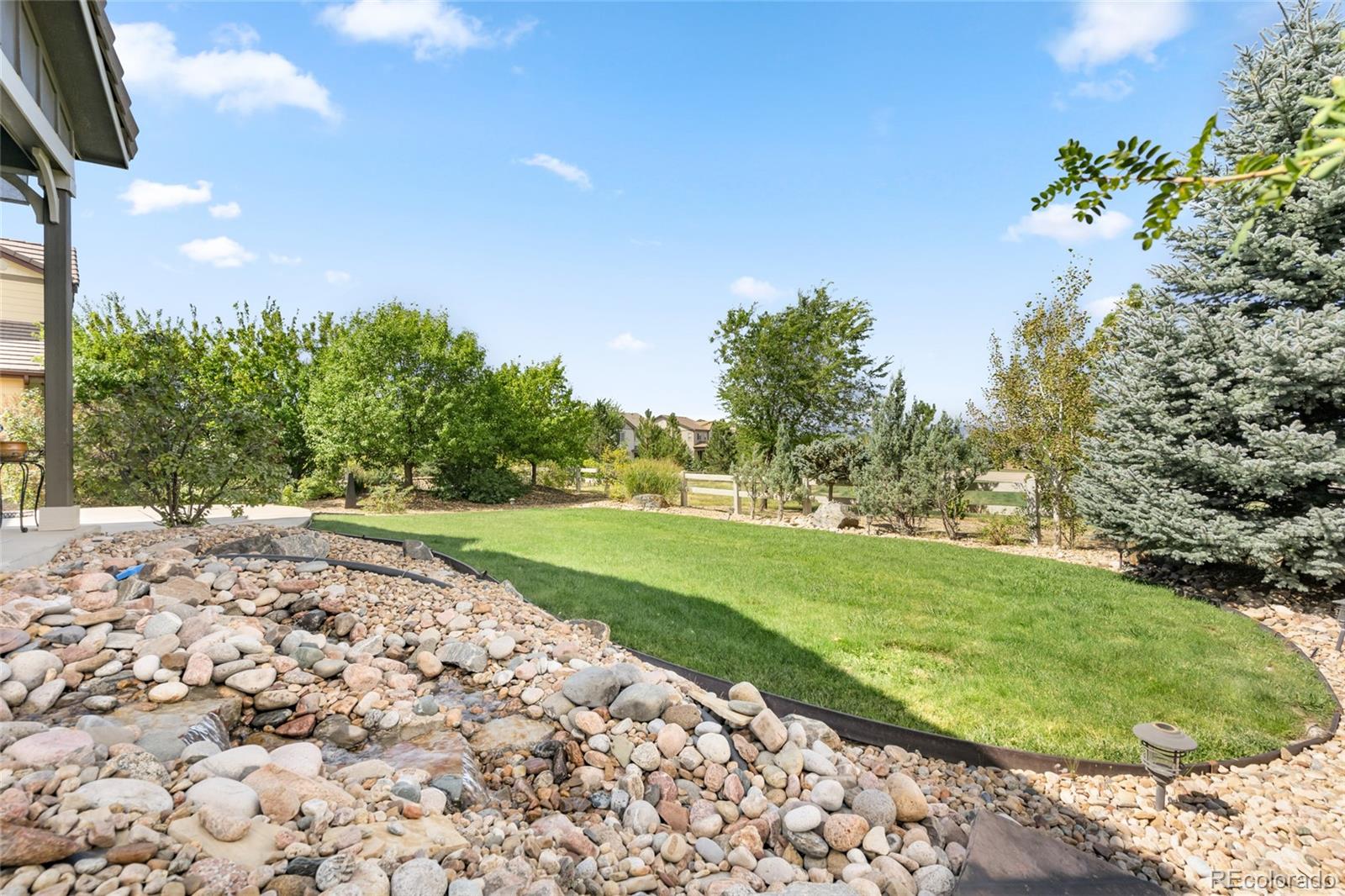 10415 Startrail Court Highlands Ranch, CO 80126 - Photo 44 of 49 a view of a garden with a pathway
