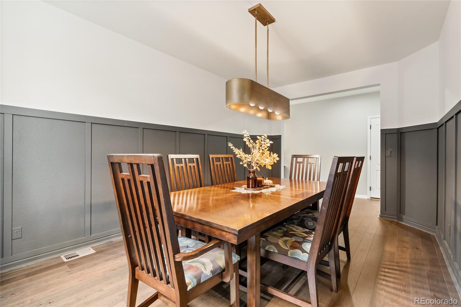 10415 Startrail Court Highlands Ranch, CO 80126 - Photo 9 of 49 a view of a dining room with furniture