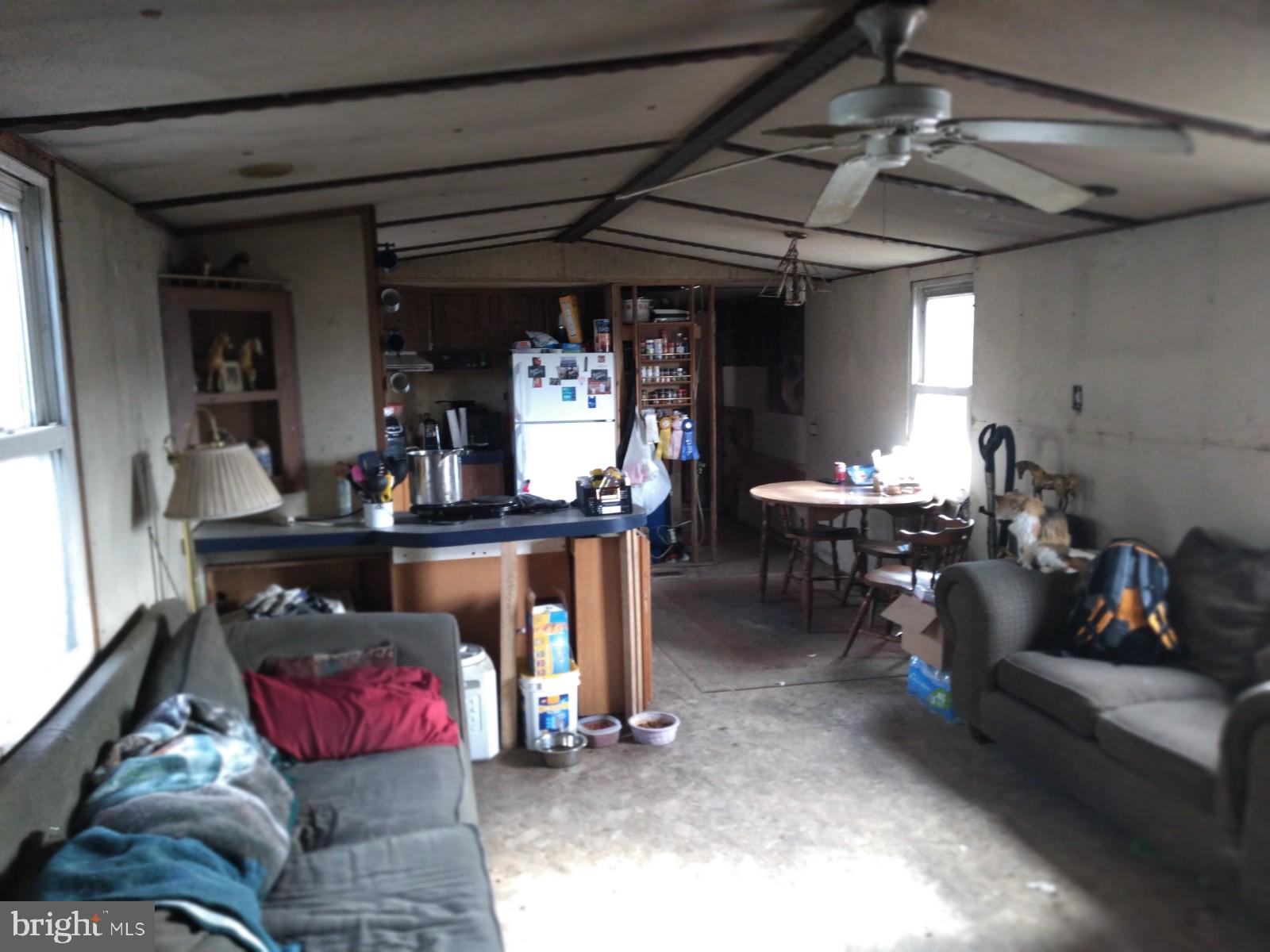 40 Ridge Road New Bloomfield, PA 17068 - Photo 3 of 7 a living room with furniture and a fireplace