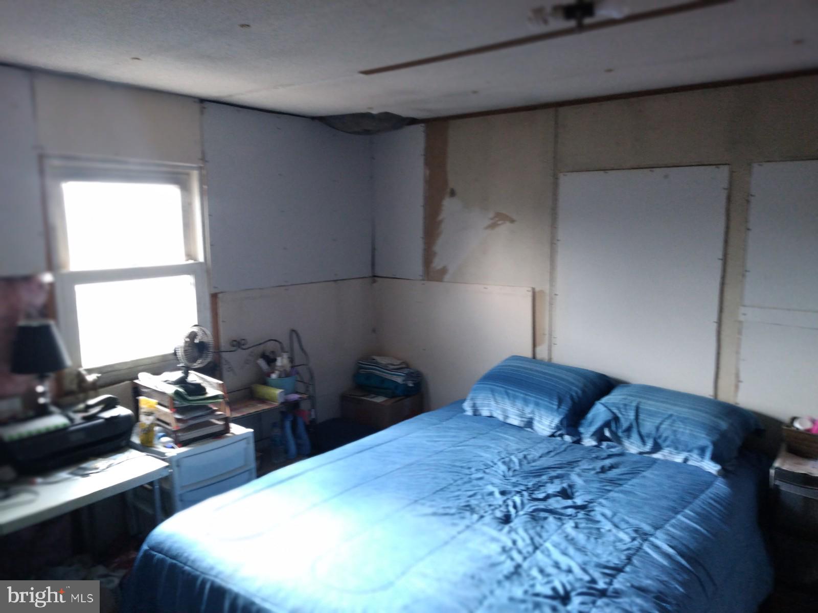 40 Ridge Road New Bloomfield, PA 17068 - Photo 5 of 7 a bedroom with a bed and two windows