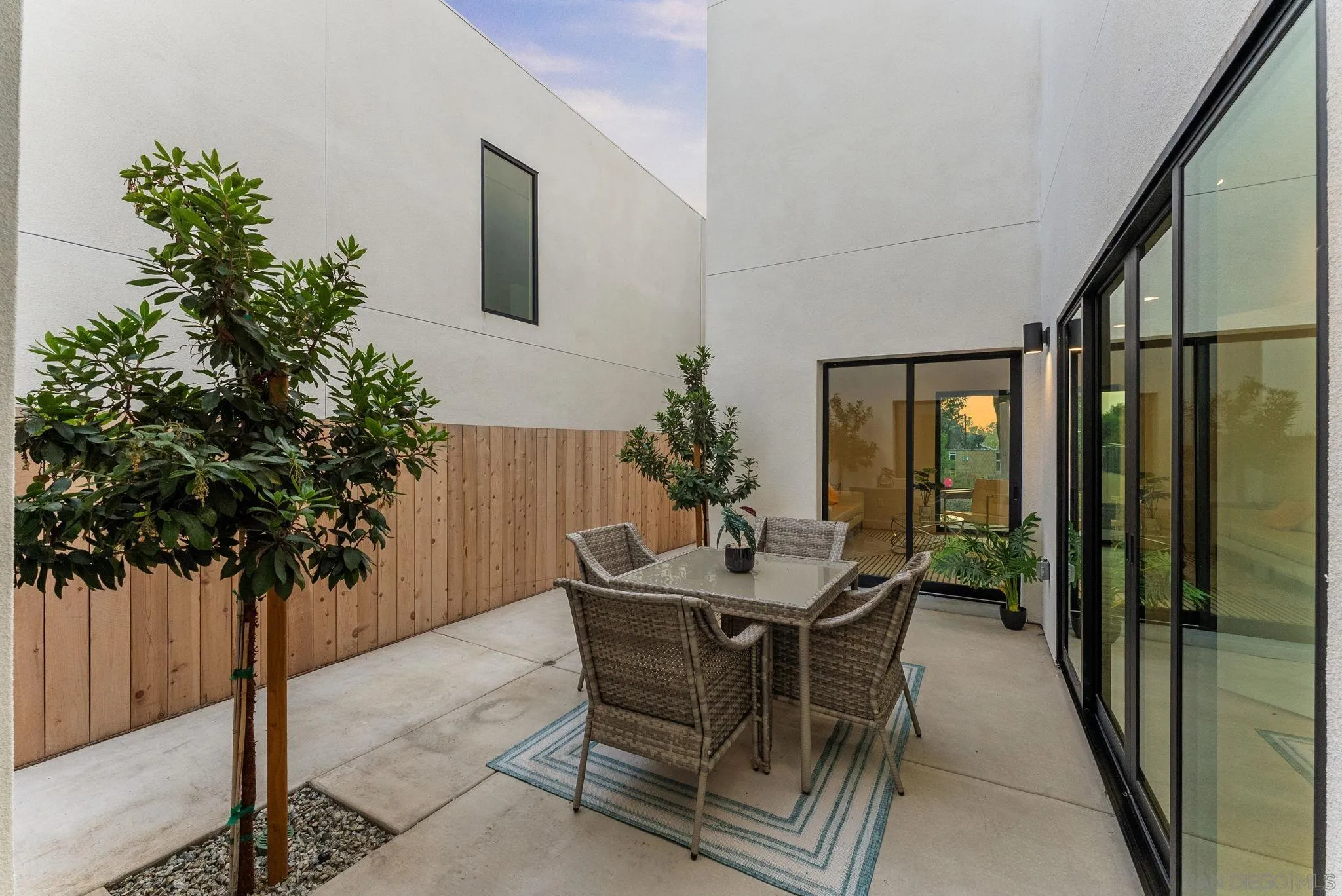 3653 Wilson Avenue San Diego, CA 92104 - Photo 11 of 60 a dining room with furniture and potted plants