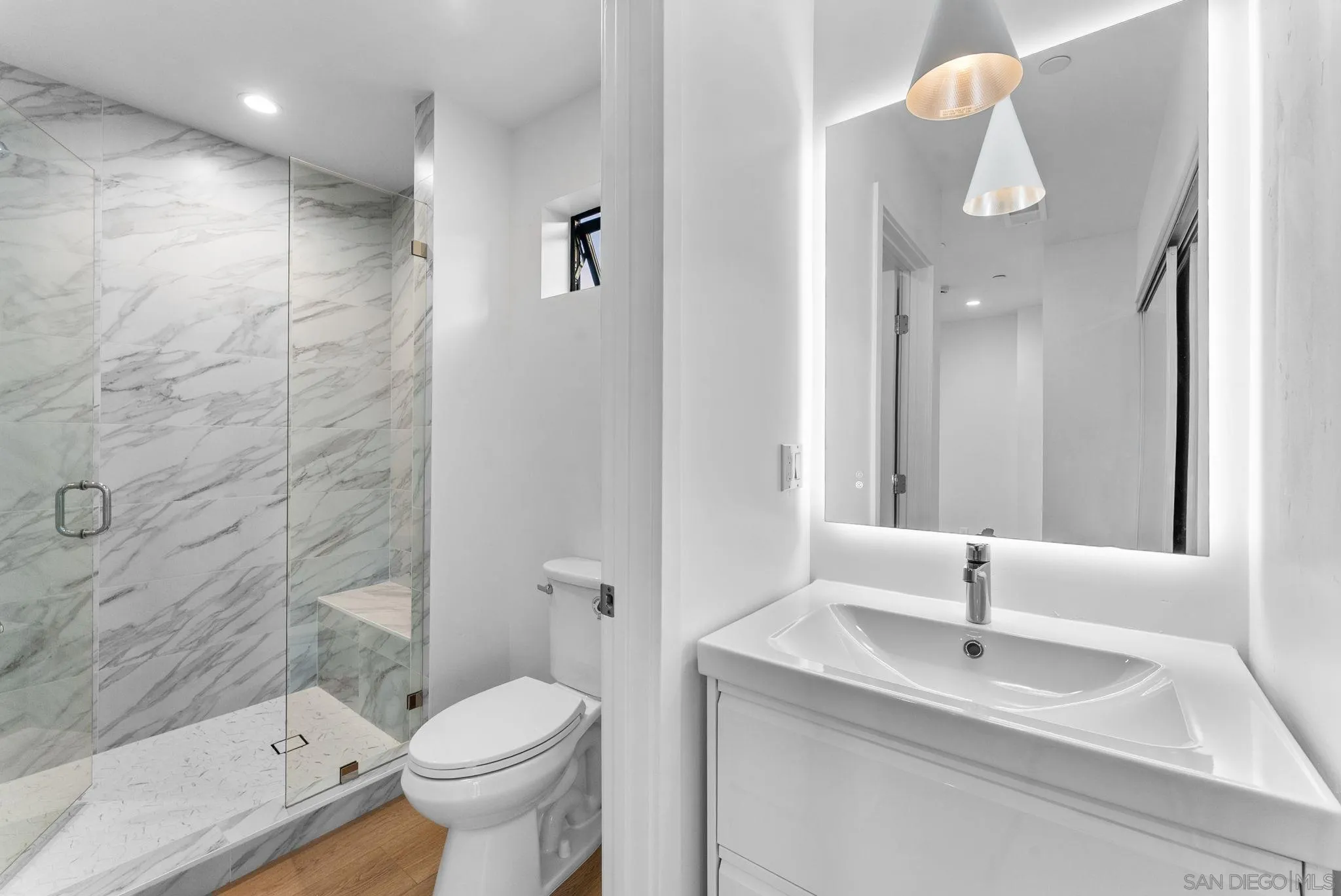 3653 Wilson Avenue San Diego, CA 92104 - Photo 25 of 60 a bathroom with a sink toilet and shower