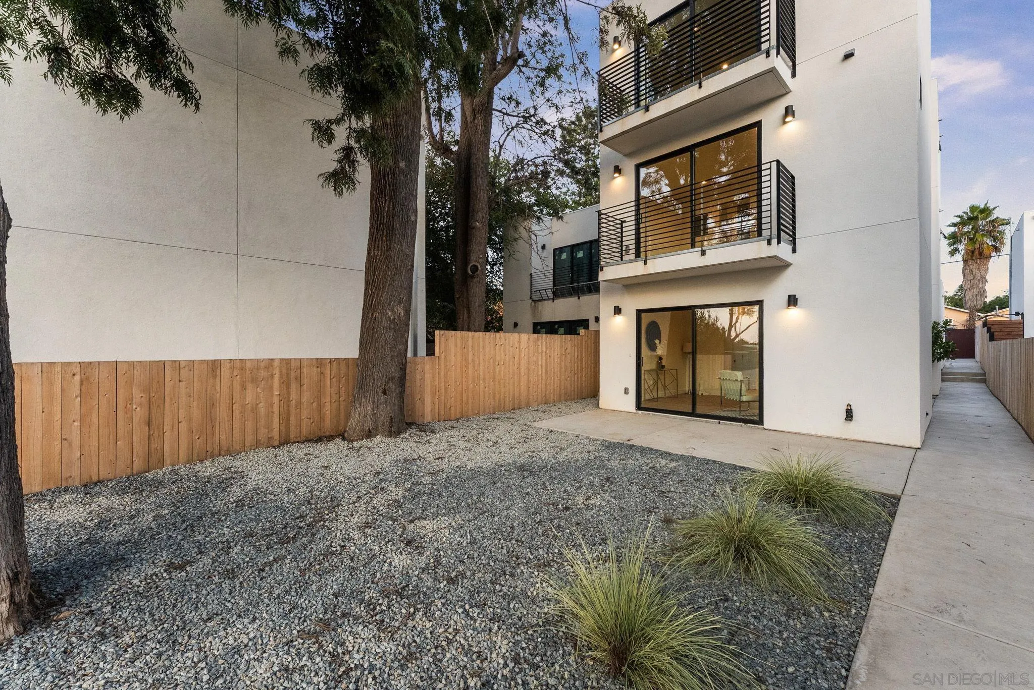 3653 Wilson Avenue San Diego, CA 92104 - Photo 40 of 60 a view of a house with a wooden fence