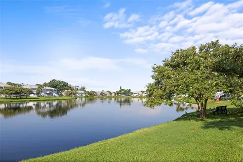 a view of a lake with a city