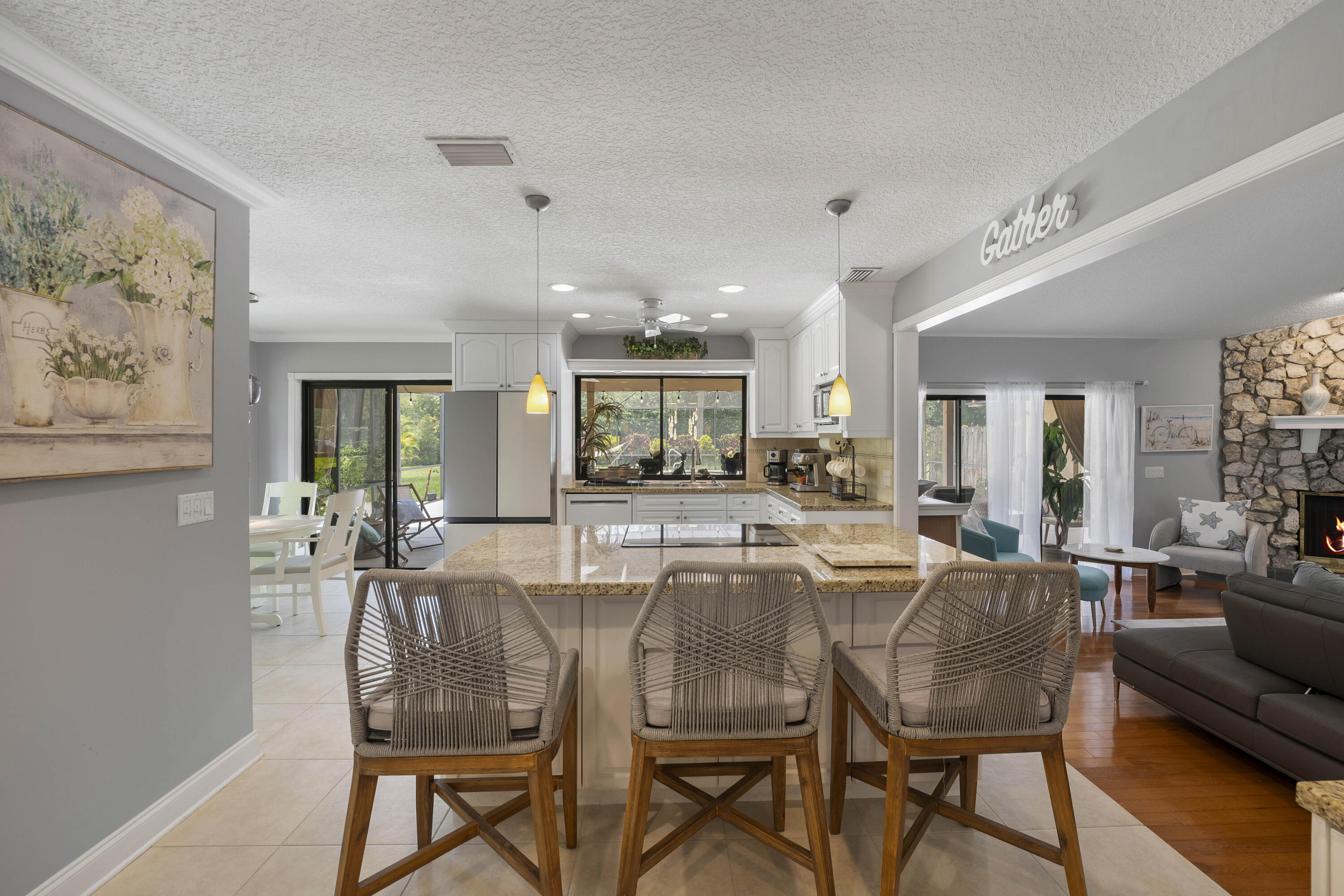 196 Scarborough Terrace Wellington, FL 33414 - Photo 20 of 33 a view of a dining room with furniture window and wooden floor