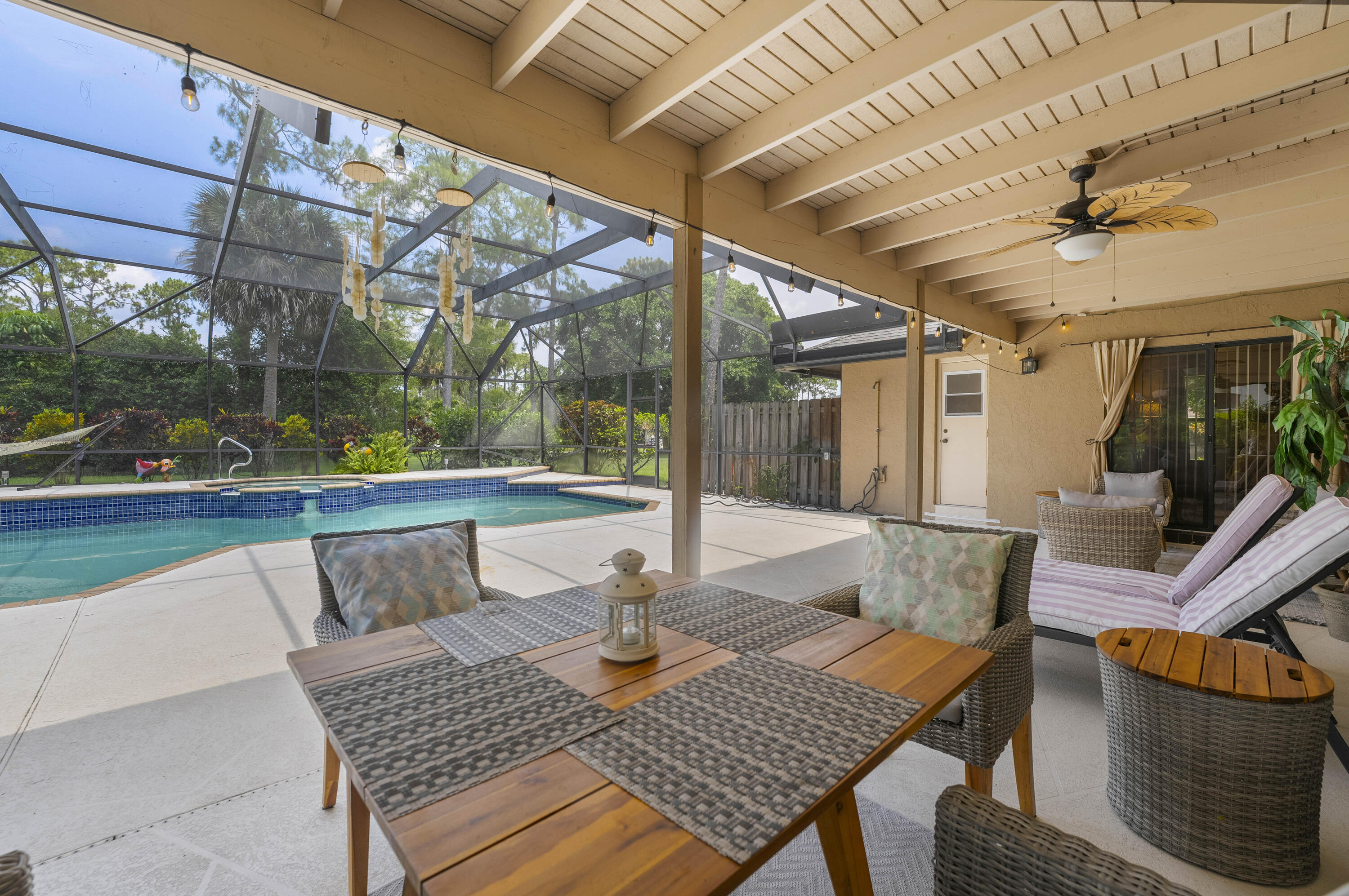 196 Scarborough Terrace Wellington, FL 33414 - Photo 29 of 33 a view of outdoor space yard deck patio and outdoor kitchen