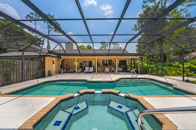 a view of a backyard with a patio
