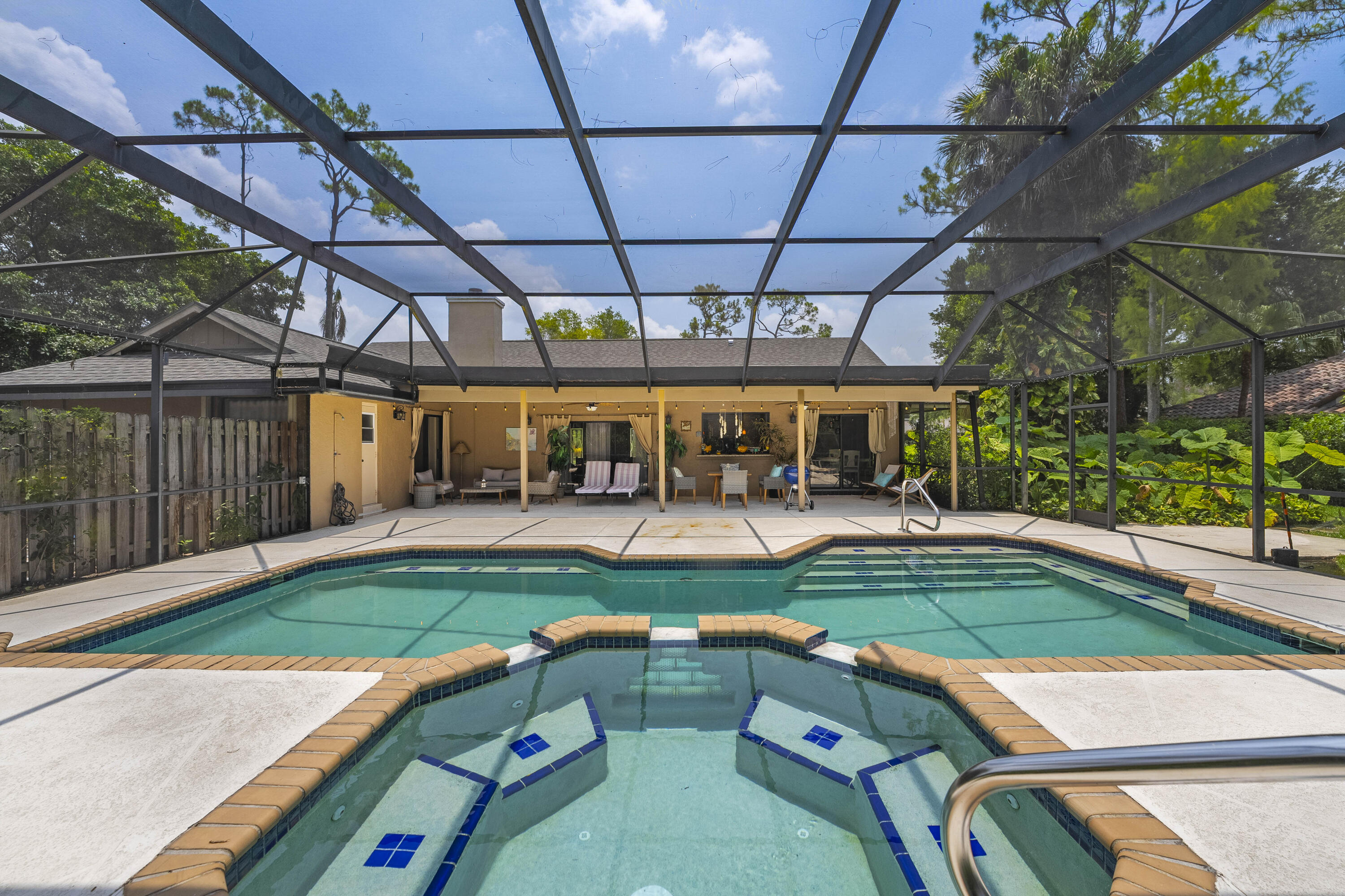 196 Scarborough Terrace Wellington, FL 33414 - Photo 32 of 33 a view of backyard with swimming pool