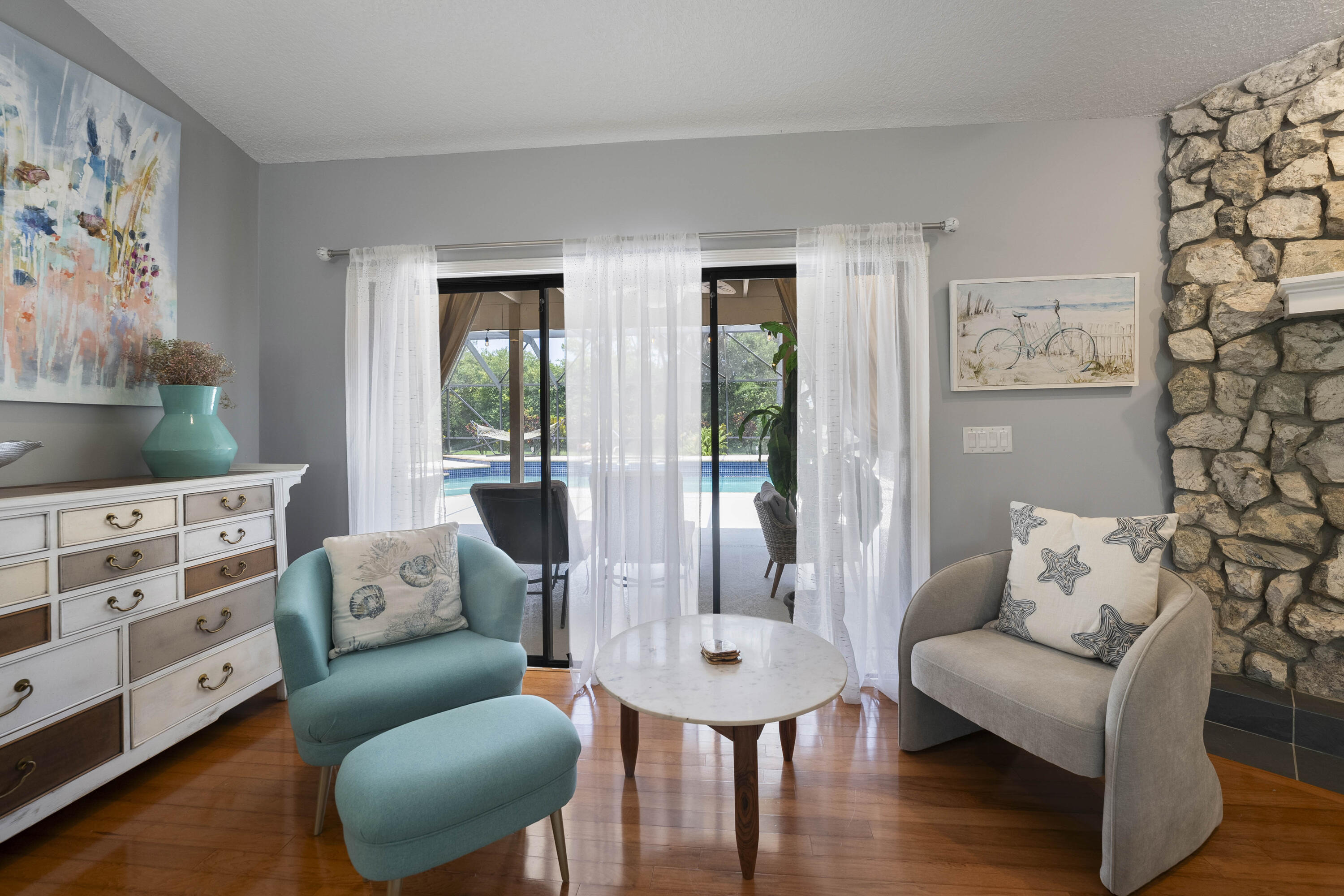 196 Scarborough Terrace Wellington, FL 33414 - Photo 10 of 33 a living room with furniture and wooden floor