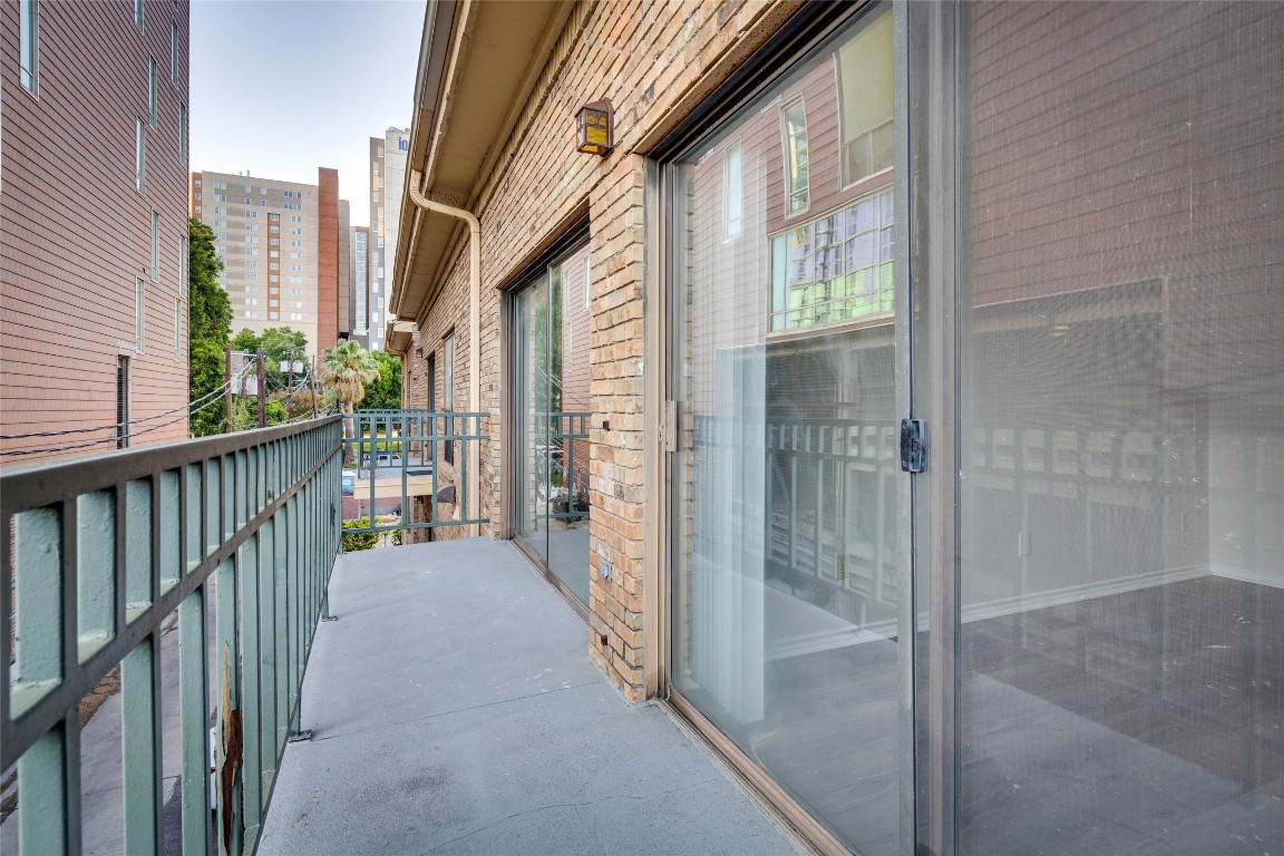 1908 San Antonio Street, Unit 306 Austin, TX 78705 - Photo 25 of 28 a view of a balcony