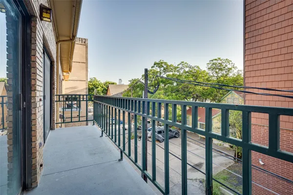 a view of a city from a balcony