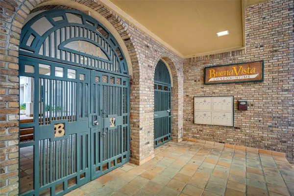 a view of a brick building with a outdoor space