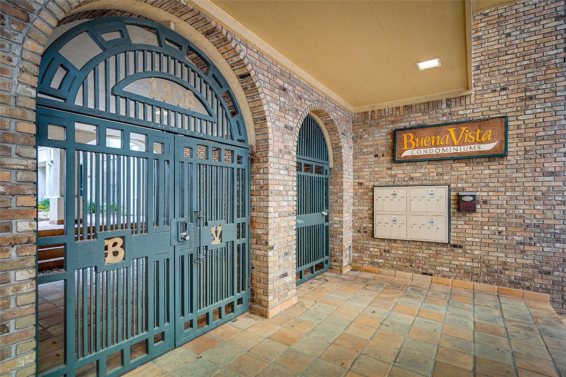 1908 San Antonio Street, Unit 306 Austin, TX 78705 - Photo 3 of 28 a view of a brick building with a outdoor space