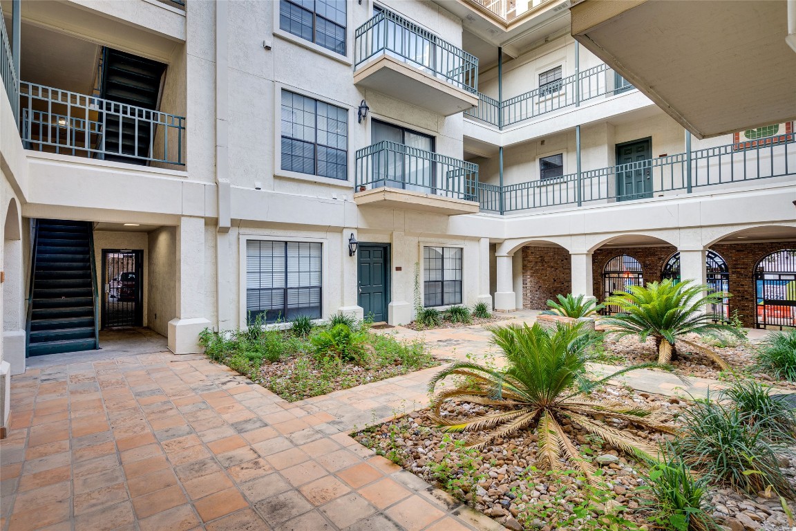 1908 San Antonio Street, Unit 306 Austin, TX 78705 - Photo 4 of 28 a front view of a multi story residential apartment building