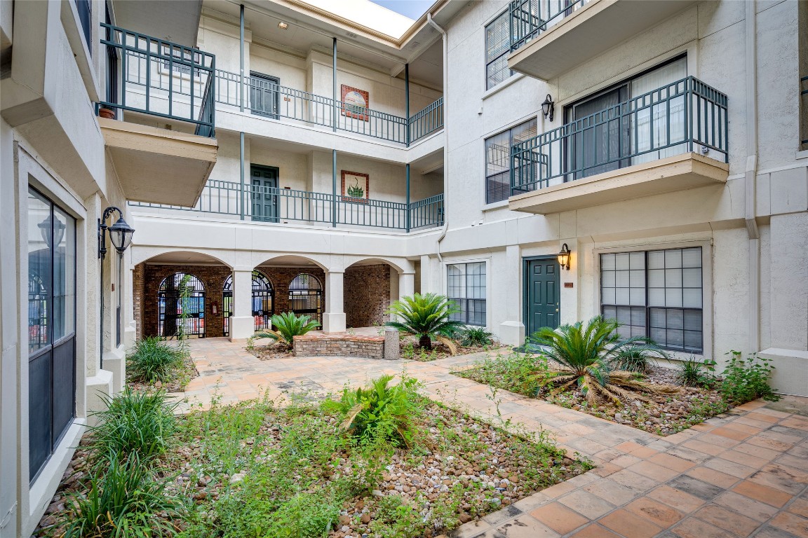 1908 San Antonio Street, Unit 306 Austin, TX 78705 - Photo 5 of 28 a front view of multiple houses