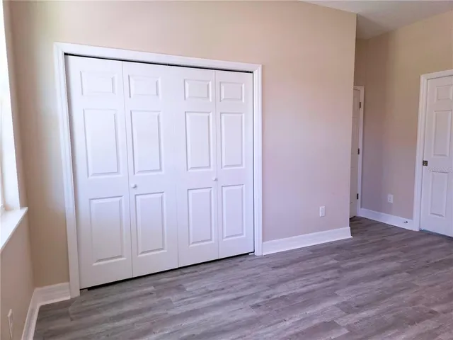 a bathroom with a toilet and a bathtub