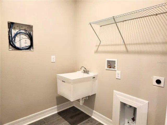 a view of a field with a tree