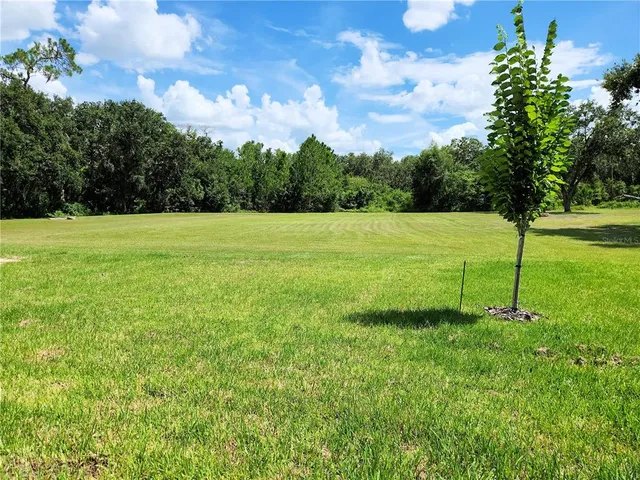 a view of an empty room with glass door
