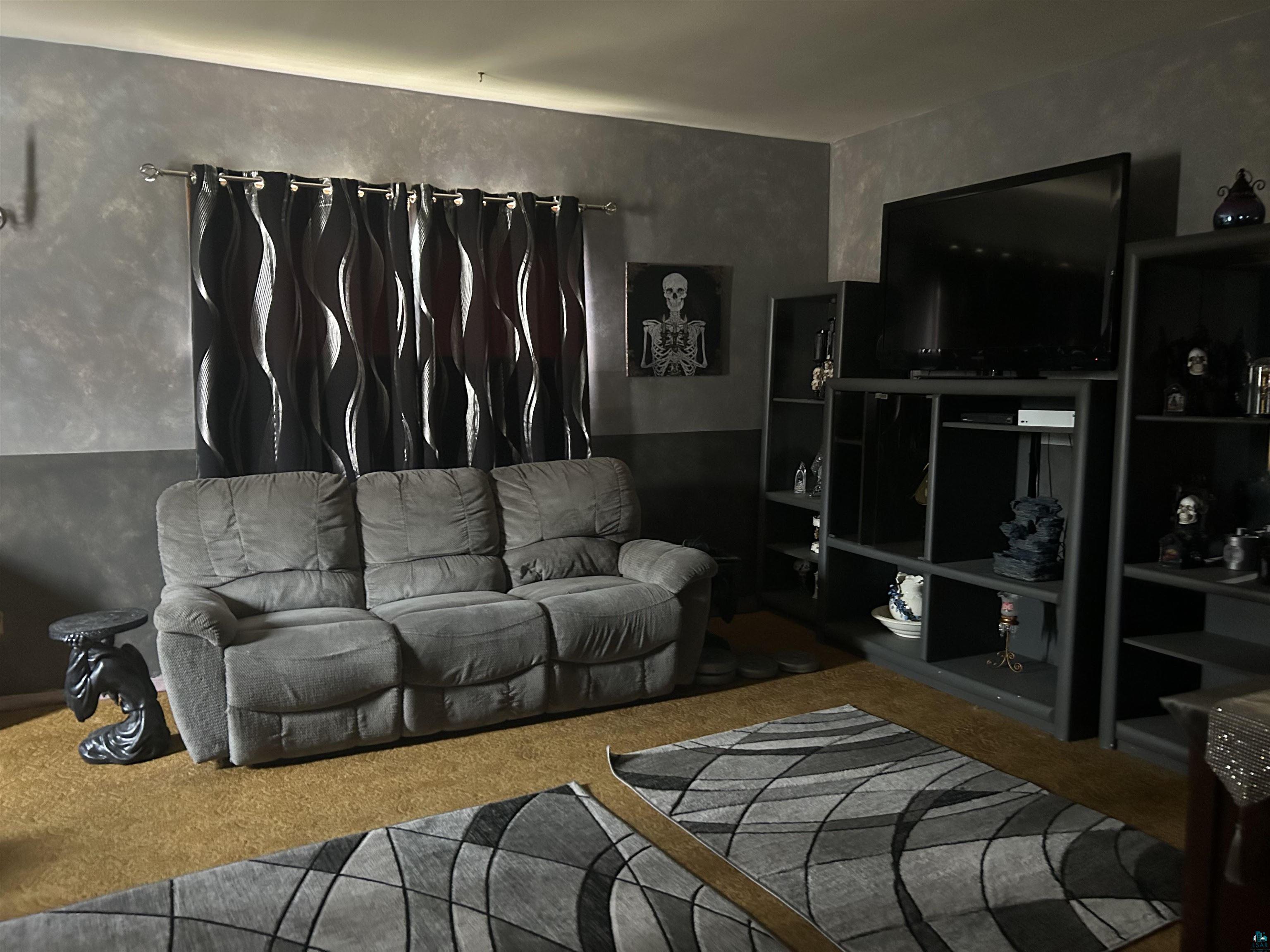 421 South Main Street Mellen, WI 54546 - Photo 4 of 8 Living room with carpet flooring
