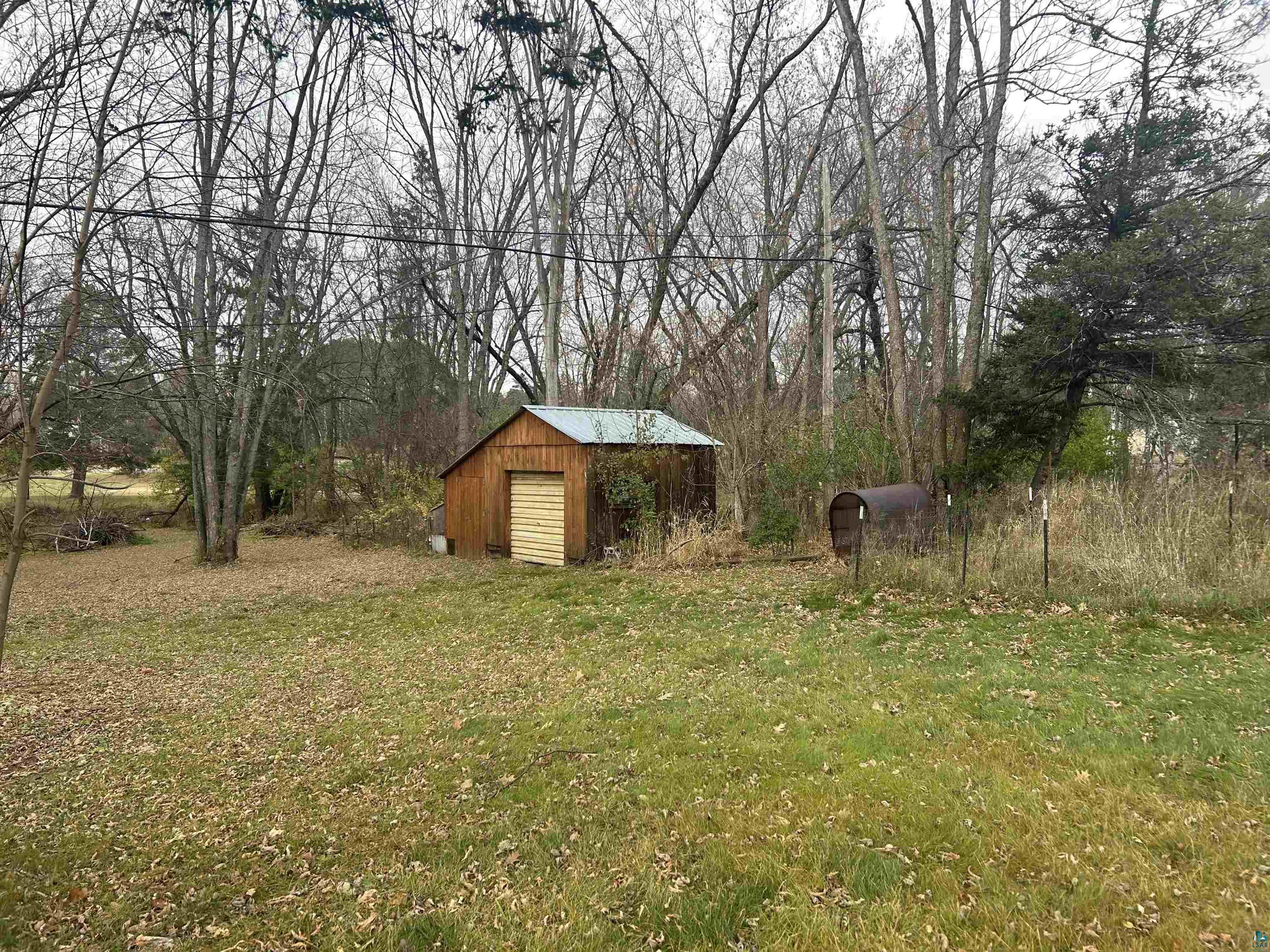 421 South Main Street Mellen, WI 54546 - Photo 8 of 8 View of yard featuring a shed