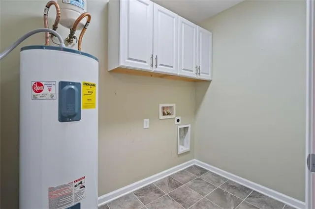 a view of storage and utility room with washer and dryer