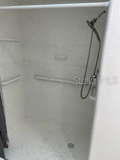 1422 Spalding Road Winter Springs, FL 32708 - Photo 14 of 34 a bathroom with a shower