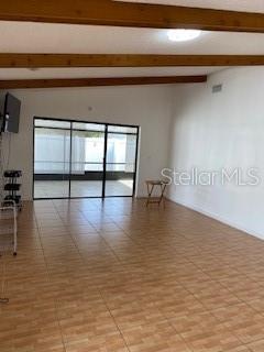 1422 Spalding Road Winter Springs, FL 32708 - Photo 7 of 34 a view of empty room with windows