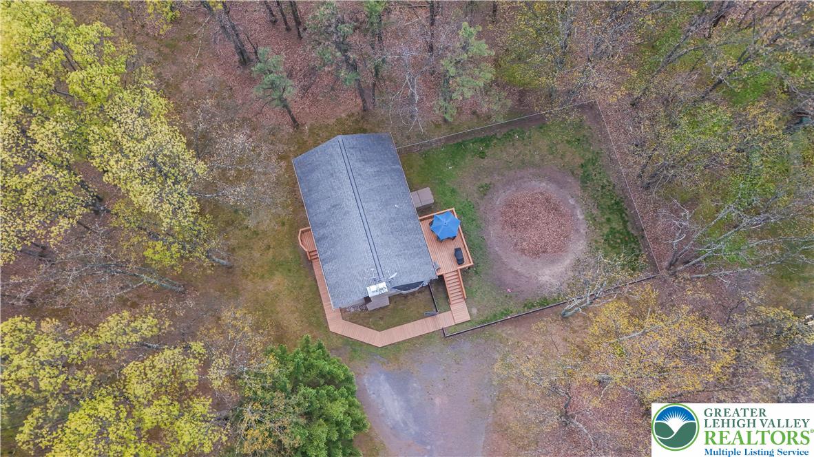 107 Shenkel Road Effort, PA 18330 - Photo 41 of 44 an aerial view of a backyard with wooden fence