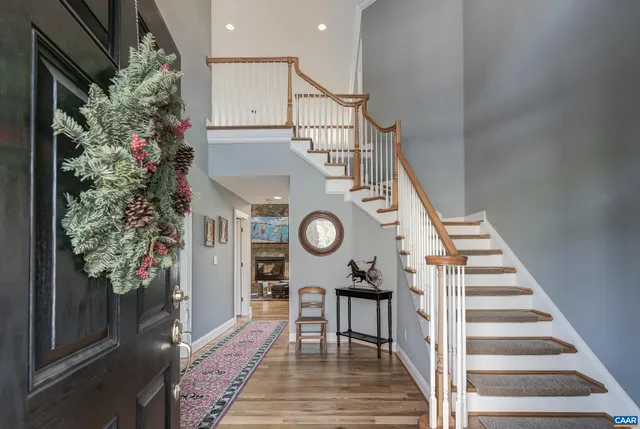a view of a livingroom with furniture and a potted plant